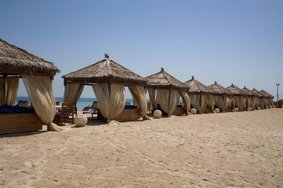 Full day desert safari with lunch or Dinner - Al Rahal Camp at the desert edge: swimming, volleyball, bonfire, and buffet food