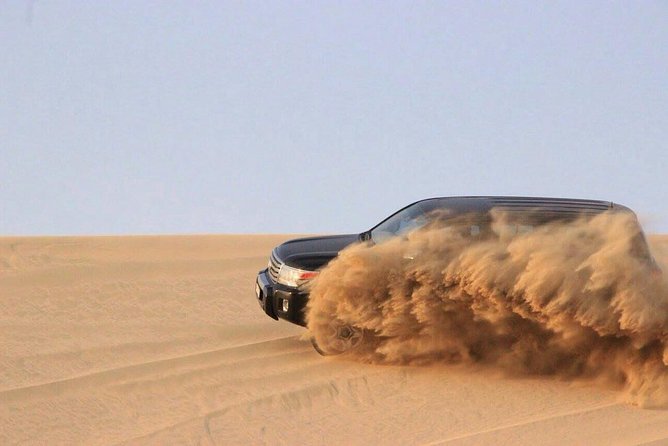 Qatar Desert Safari Adventure Experience . - Pickup From Doha: The Part That Sets the Tone