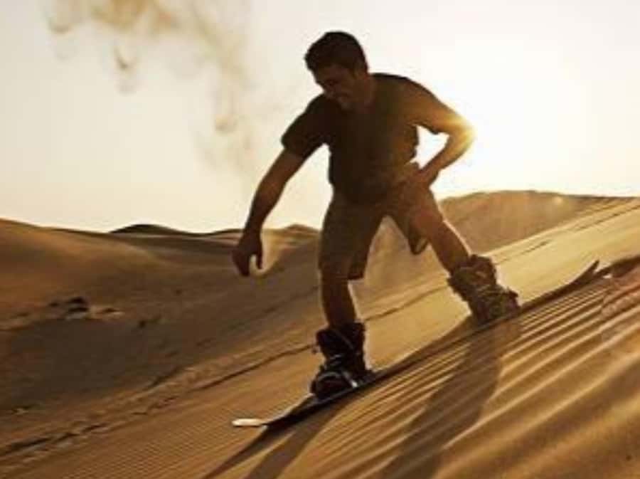 Qatar Desert Safari, Quad bike, Camel Ride and Sandboarding - Sunset Mood and Photo Timing: The Golden Hour Factor