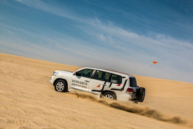 Qatar Half Day Desert Safari(Camel Rides & Sandboarding) - The dune bashing part: 50-meter sand and how to enjoy it safely