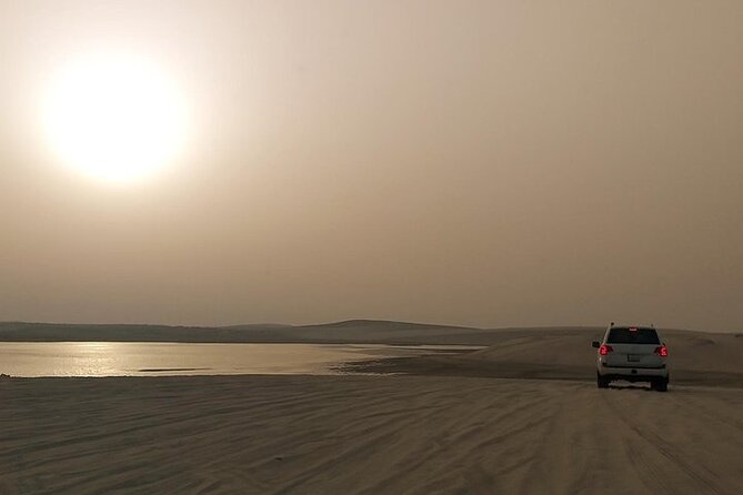 Qatar Sunset Desert Safari: Dune Bashing & Golden Sands Adventure - Sandboarding and Camel Camp: The Stops That Add Texture