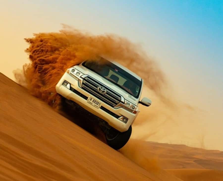 Qatar: Sunset Desert Safari with Camel Ride & Sandboarding - Pickup, drop-off, and how to plan your evening