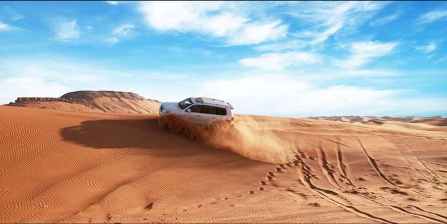 Quad Bike/Buggy, Desert Safari, Camel Ride, Dune Bashing - Sandboarding: How to Have More Fun Than You Think You Will