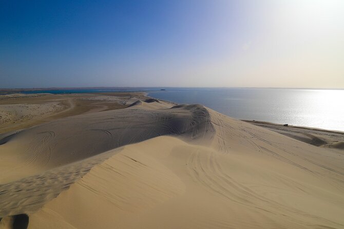 Special Private Arabic Setup with Desert safari experience. - A Doha desert safari with an Arabian setup, not a theme park
